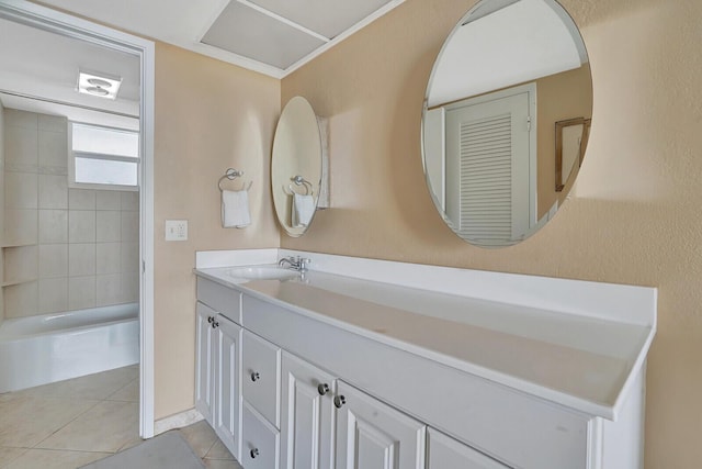 bathroom featuring tile patterned flooring and vanity