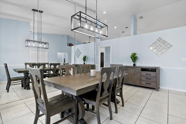 dining space with light tile patterned floors