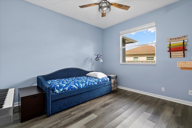 bedroom featuring wood-type flooring and ceiling fan