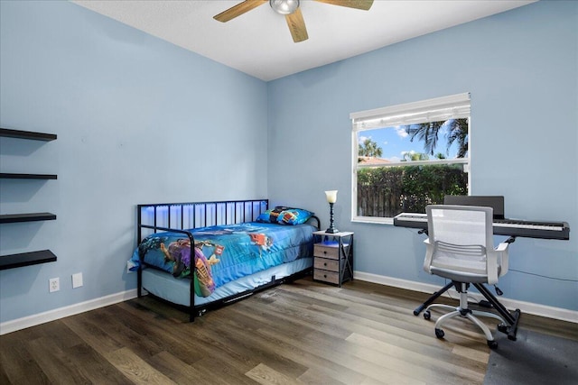 bedroom with hardwood / wood-style flooring and ceiling fan