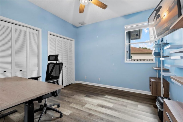 office area featuring hardwood / wood-style flooring and ceiling fan