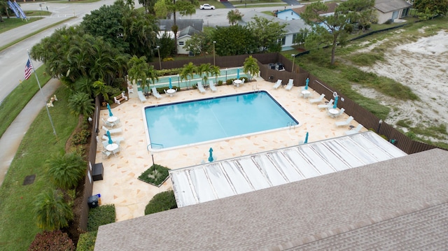 view of swimming pool with a patio area