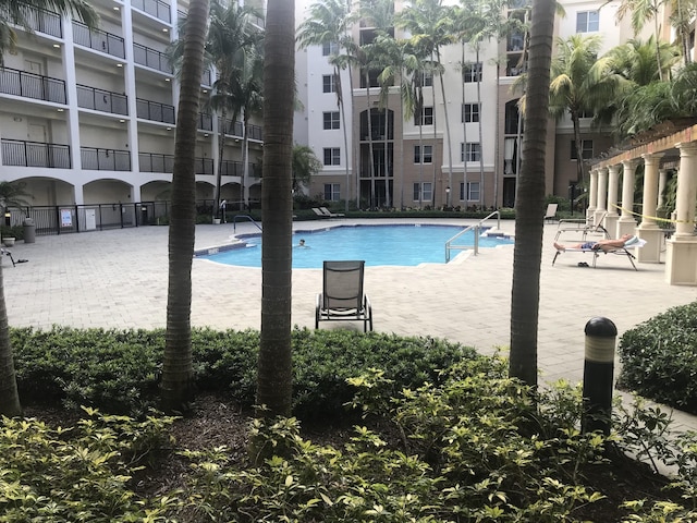 view of swimming pool featuring a patio