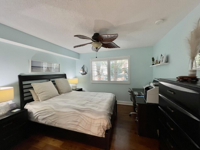 dining room featuring sink, light tile patterned floors, ceiling fan with notable chandelier, and a textured ceiling