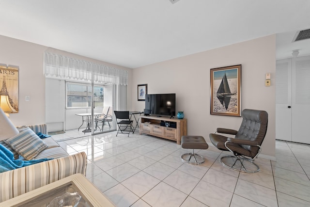 living room featuring light tile patterned floors