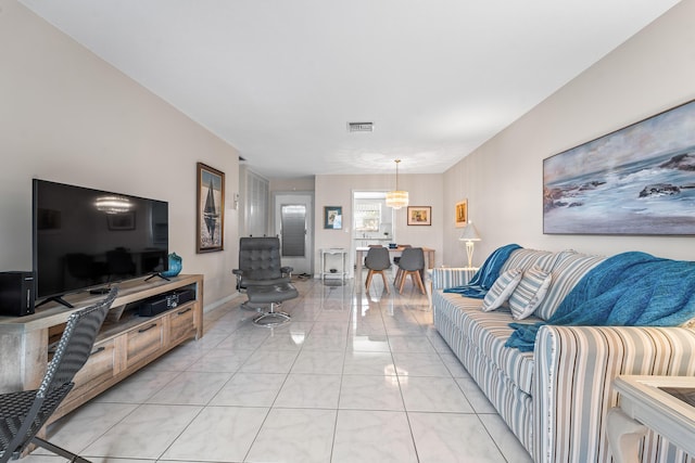 living room featuring light tile patterned floors