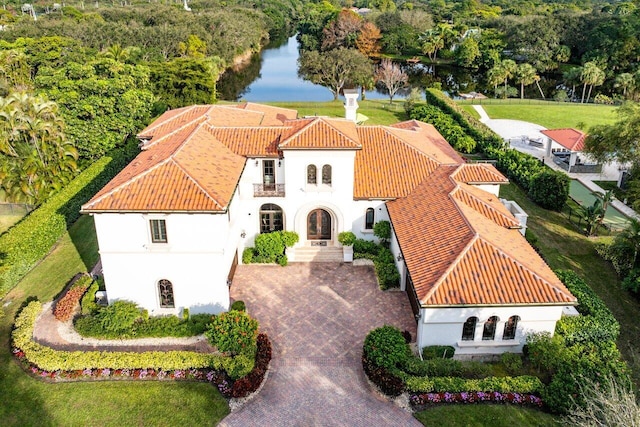 birds eye view of property featuring a water view