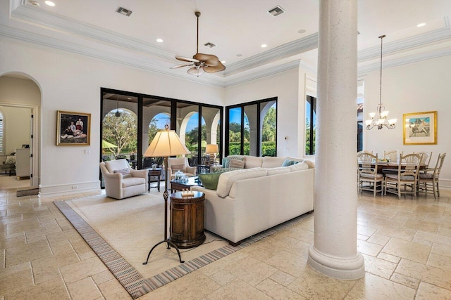 living room with baseboards, visible vents, ceiling fan with notable chandelier, and stone tile floors