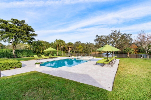 view of pool featuring a fenced backyard, an in ground hot tub, a patio area, and a lawn