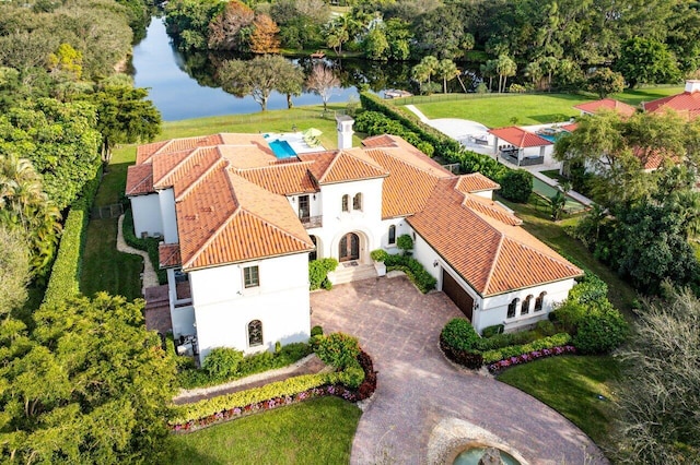 bird's eye view with a water view