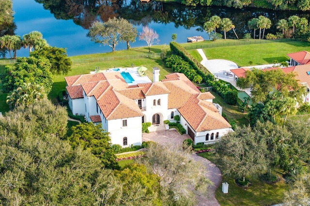 drone / aerial view with a water view