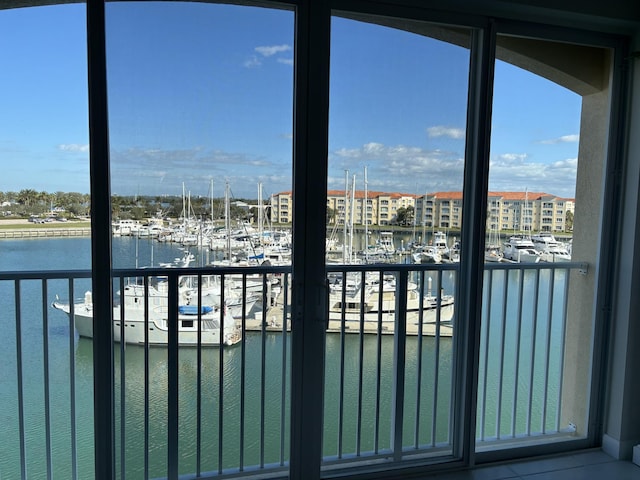 exterior space with a water view and a wealth of natural light