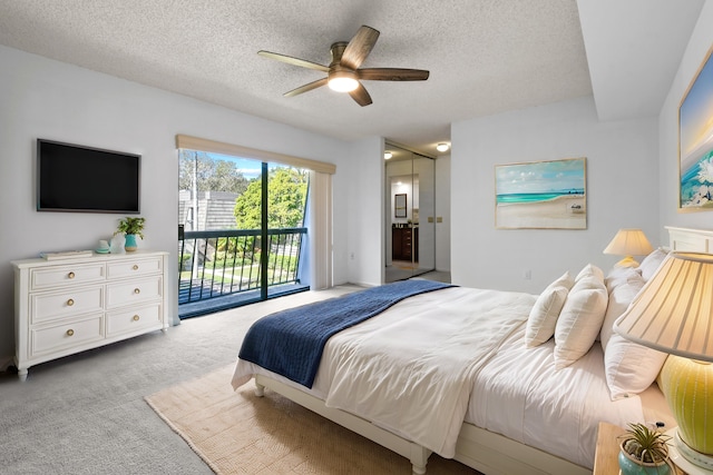 bedroom with ceiling fan, light colored carpet, a textured ceiling, and access to outside