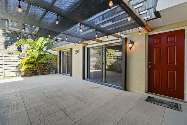 view of patio featuring a pergola