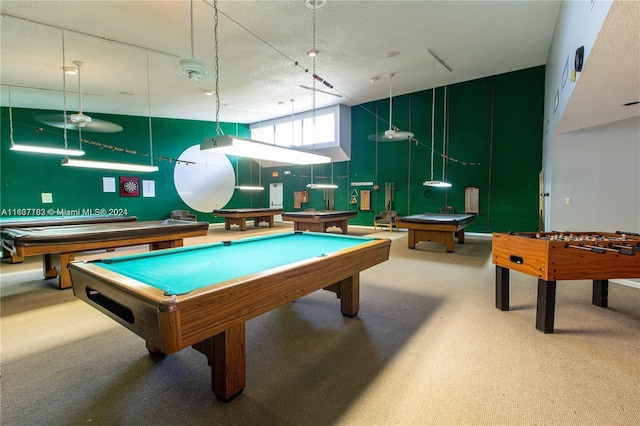 recreation room featuring a high ceiling and billiards