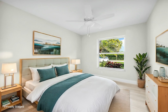 bedroom with light hardwood / wood-style flooring