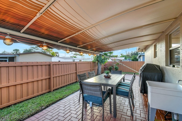 view of patio with a grill