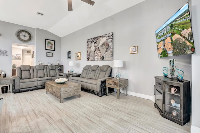 living room featuring lofted ceiling and ceiling fan