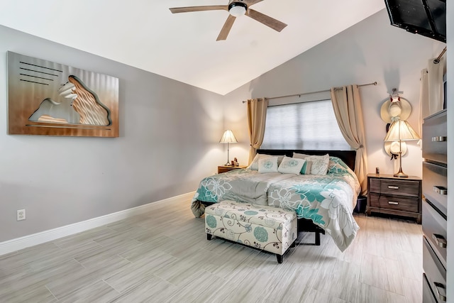 bedroom with lofted ceiling and ceiling fan