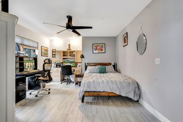 bedroom featuring ceiling fan and light hardwood / wood-style flooring