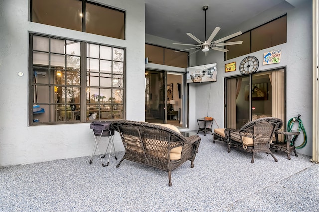 view of patio / terrace featuring an outdoor living space and ceiling fan