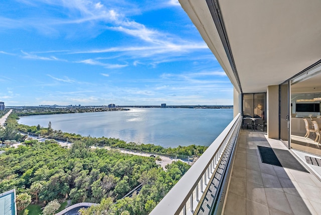 balcony featuring a water view