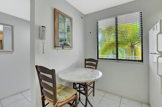 view of tiled dining space