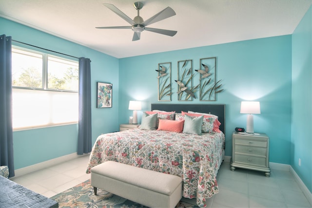 bedroom featuring tile patterned floors and ceiling fan