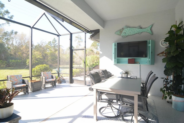 view of patio / terrace featuring glass enclosure