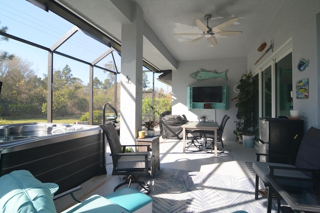 sunroom / solarium with ceiling fan