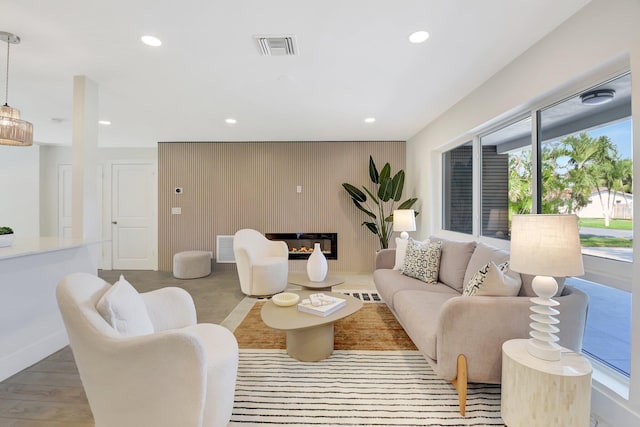 living room with light hardwood / wood-style flooring