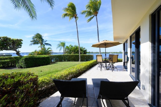 view of patio / terrace with a water view