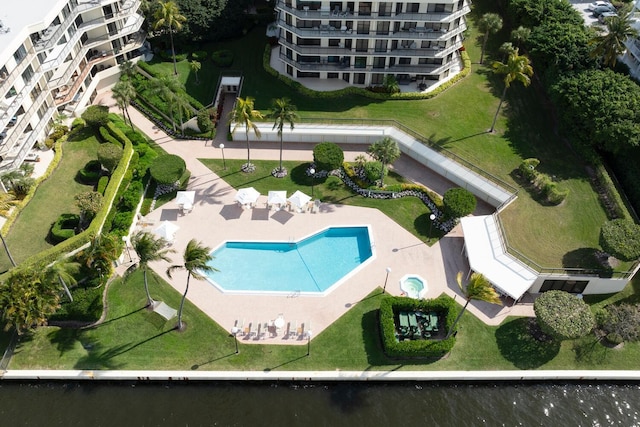 birds eye view of property featuring a water view