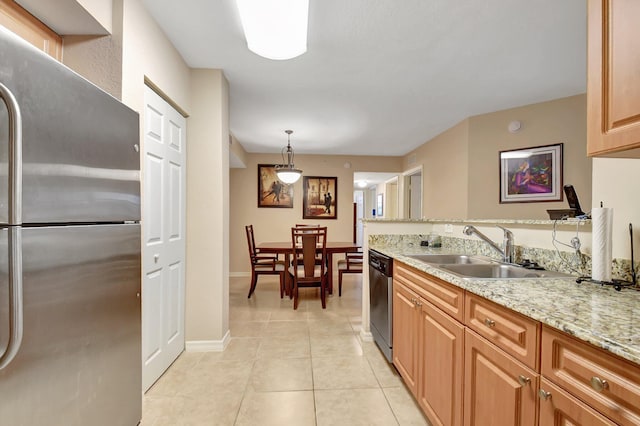 kitchen featuring sink, light tile patterned floors, pendant lighting, stainless steel appliances, and light stone countertops