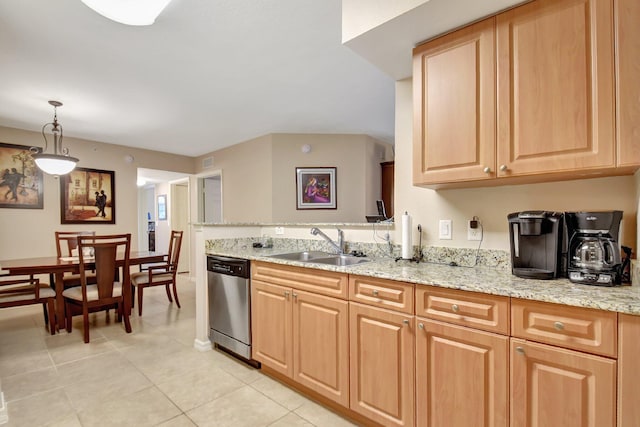 kitchen featuring sink, light tile patterned floors, stainless steel dishwasher, pendant lighting, and light stone countertops