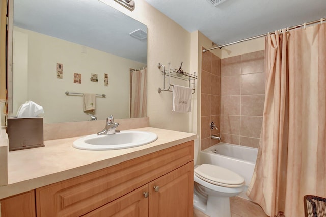 full bathroom with vanity, shower / bath combo, tile patterned floors, and toilet