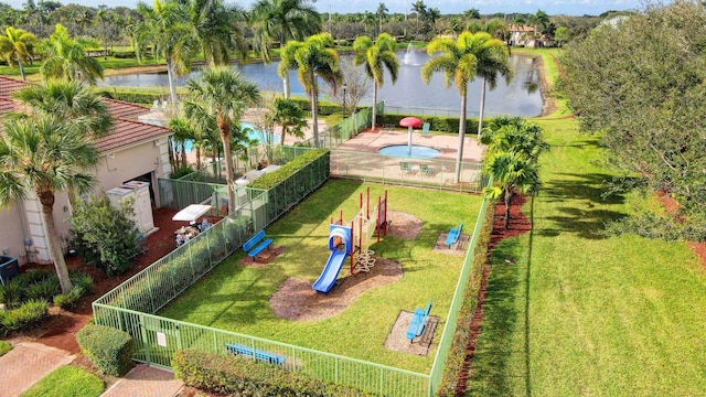 birds eye view of property featuring a water view