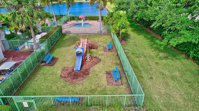 surrounding community featuring a water view, a pool, a playground, and a lawn