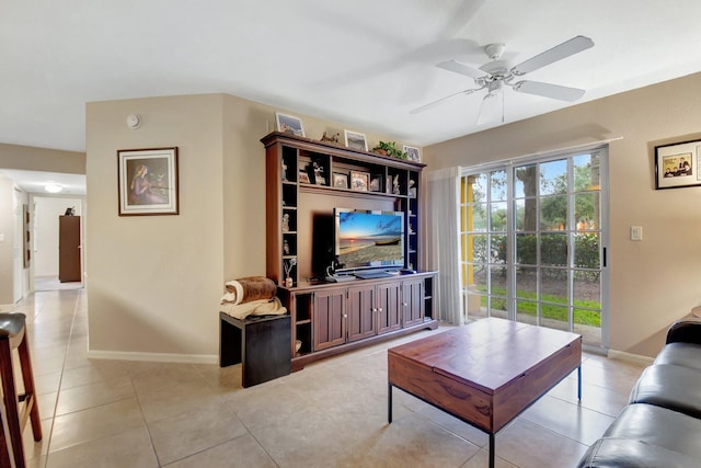 living room with light tile patterned floors and ceiling fan