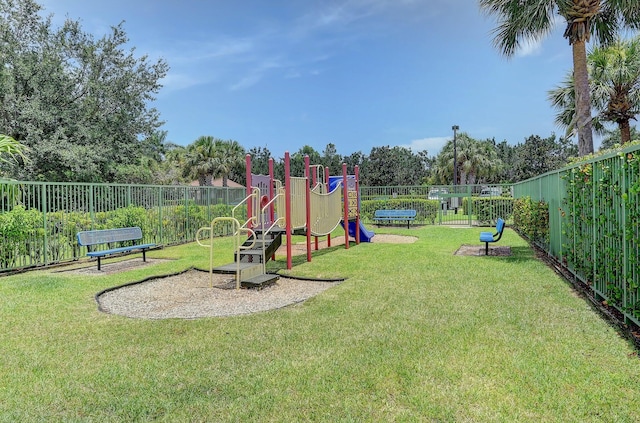 view of jungle gym with a lawn