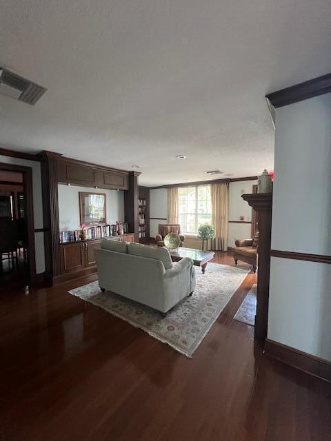 living room featuring dark hardwood / wood-style floors