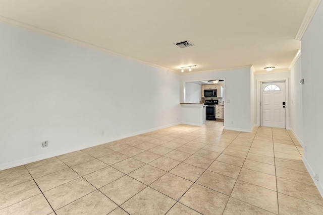 interior space with ornamental molding and light tile patterned flooring