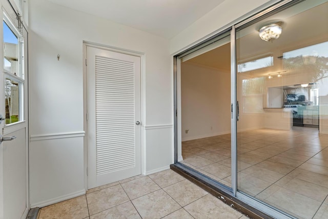 interior space with light tile patterned floors