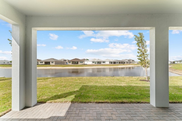 view of patio / terrace with a water view