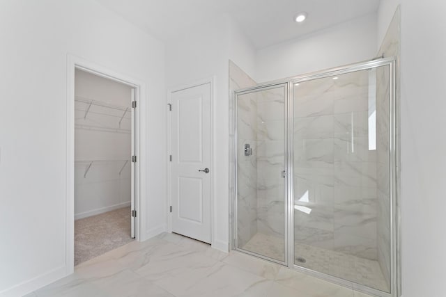 bathroom featuring an enclosed shower