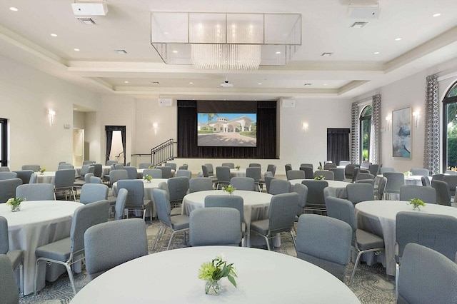 cinema with visible vents, recessed lighting, and a raised ceiling