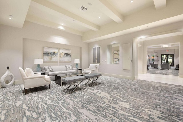 living room featuring recessed lighting, visible vents, beam ceiling, and baseboards
