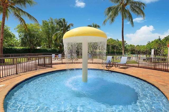view of pool with fence