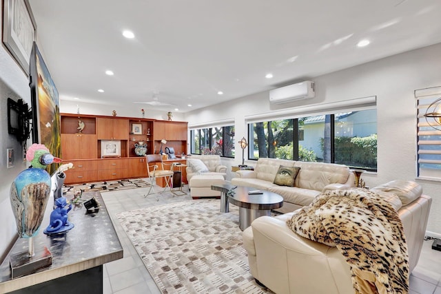 tiled living room featuring an AC wall unit