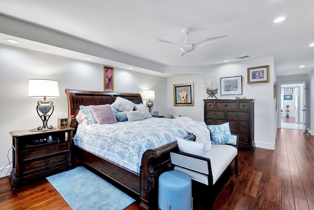 bedroom featuring ceiling fan and dark hardwood / wood-style flooring